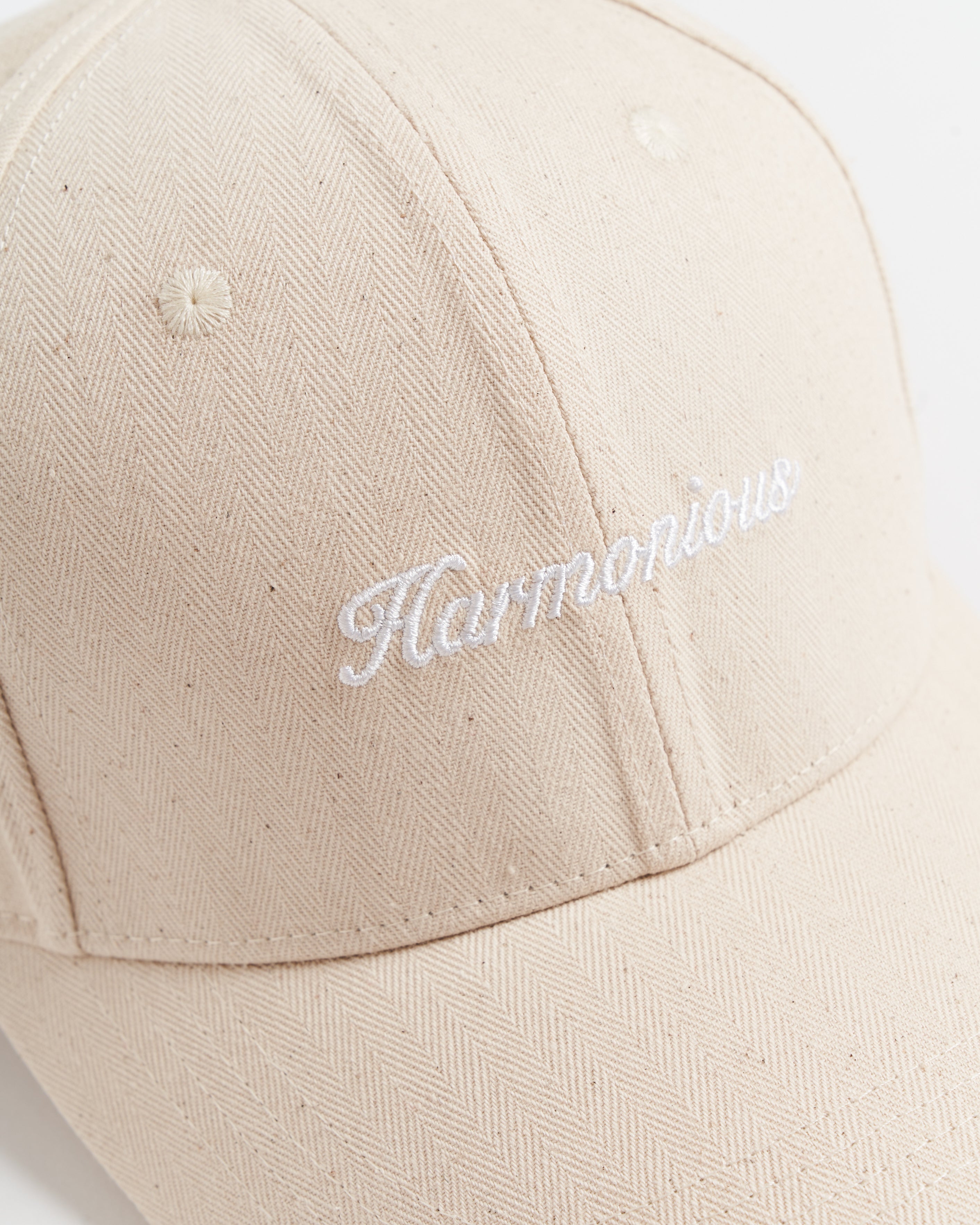 Harmonious textured script cap