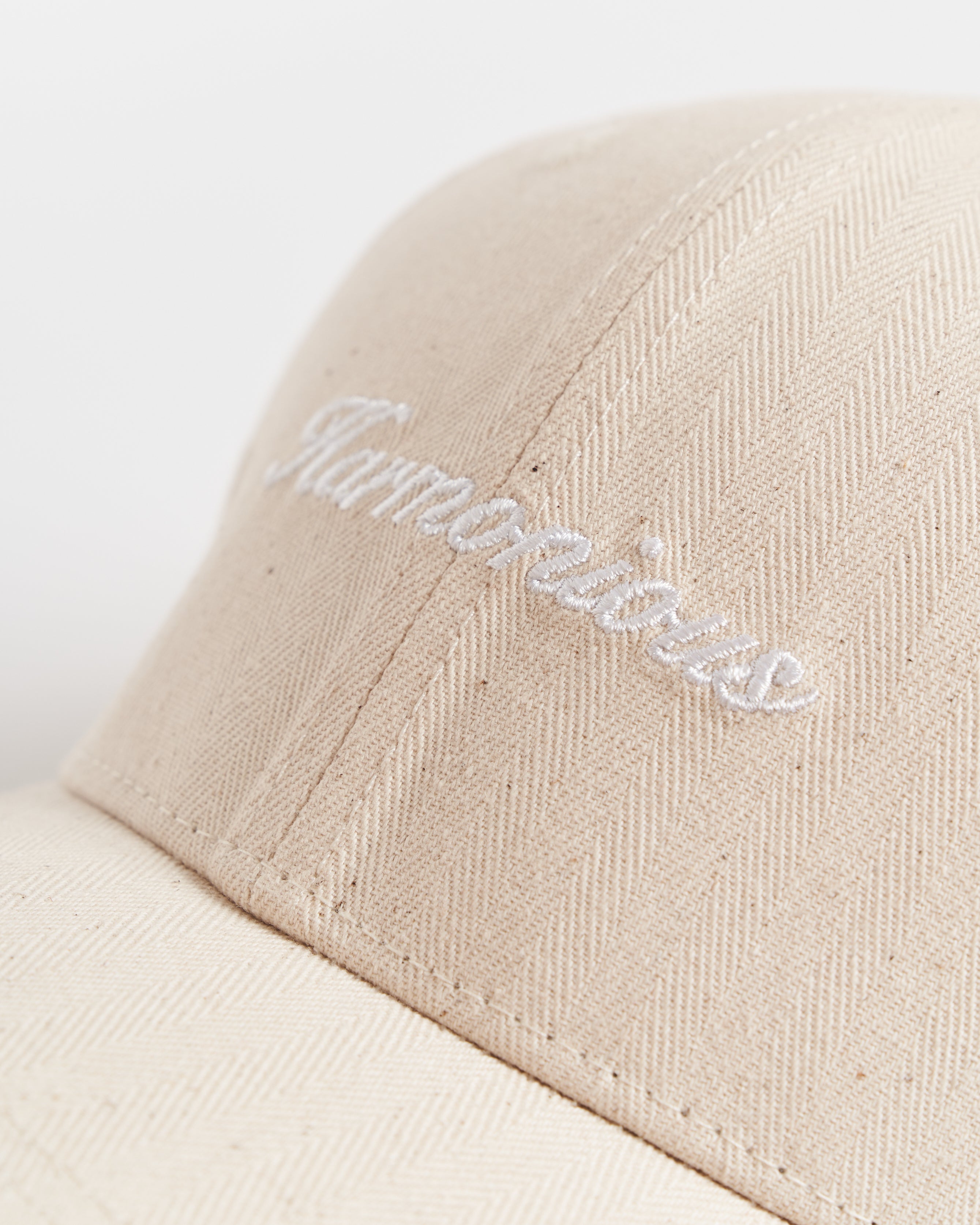 Harmonious textured script cap