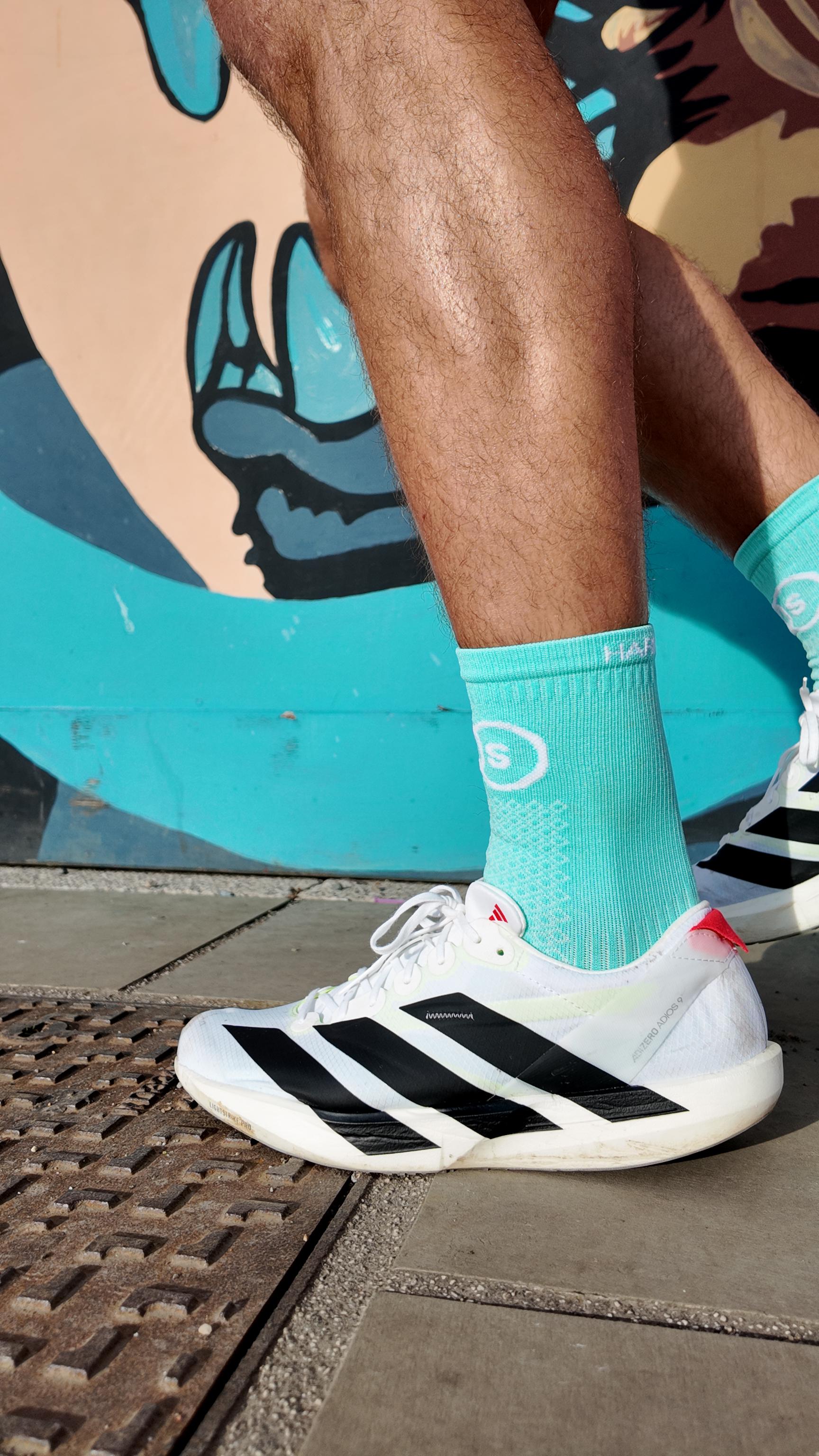 Curiosity is our Superpower Socks - Turquoise